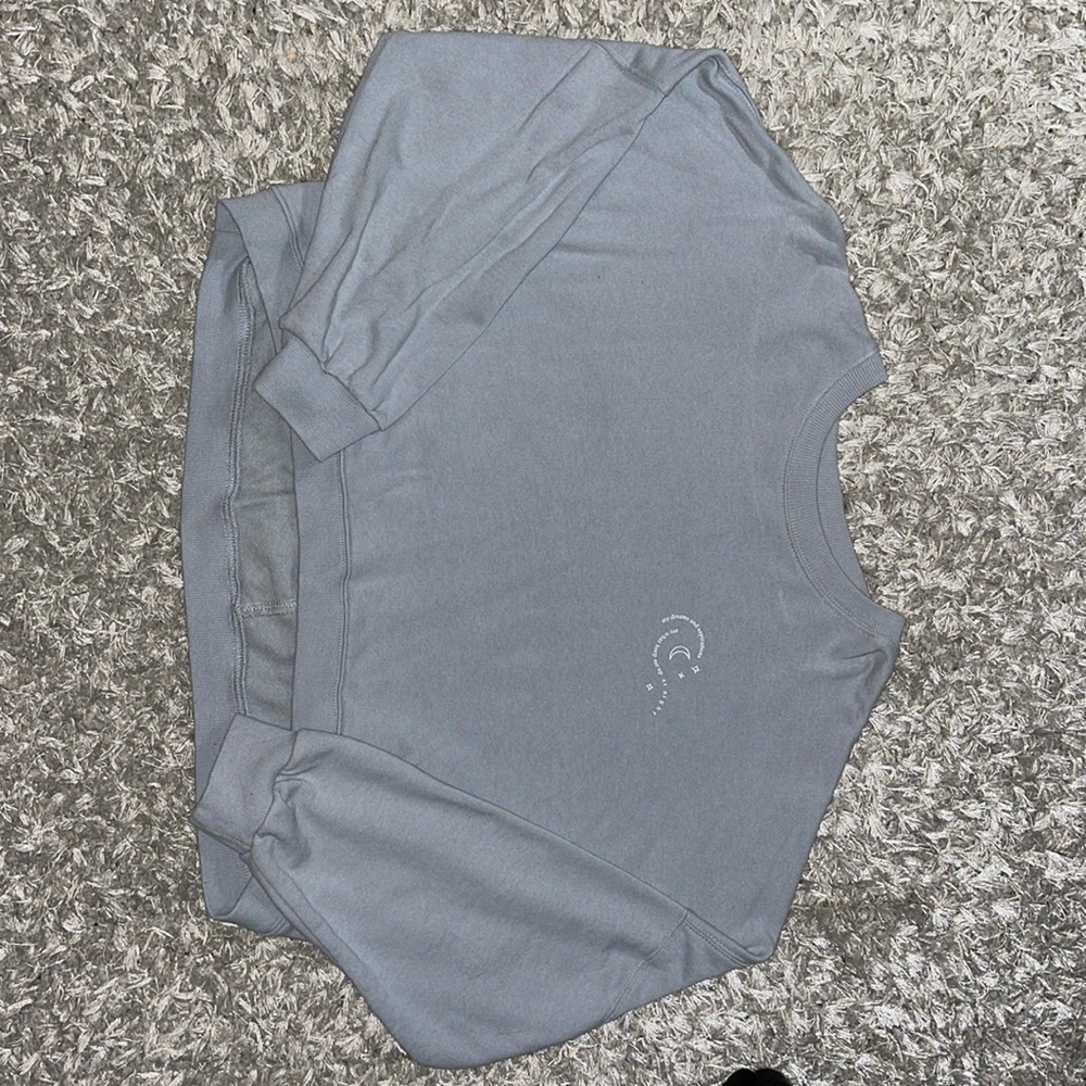 Cotton On baby blue cropped sweatshirt, size Large, small writing on top left